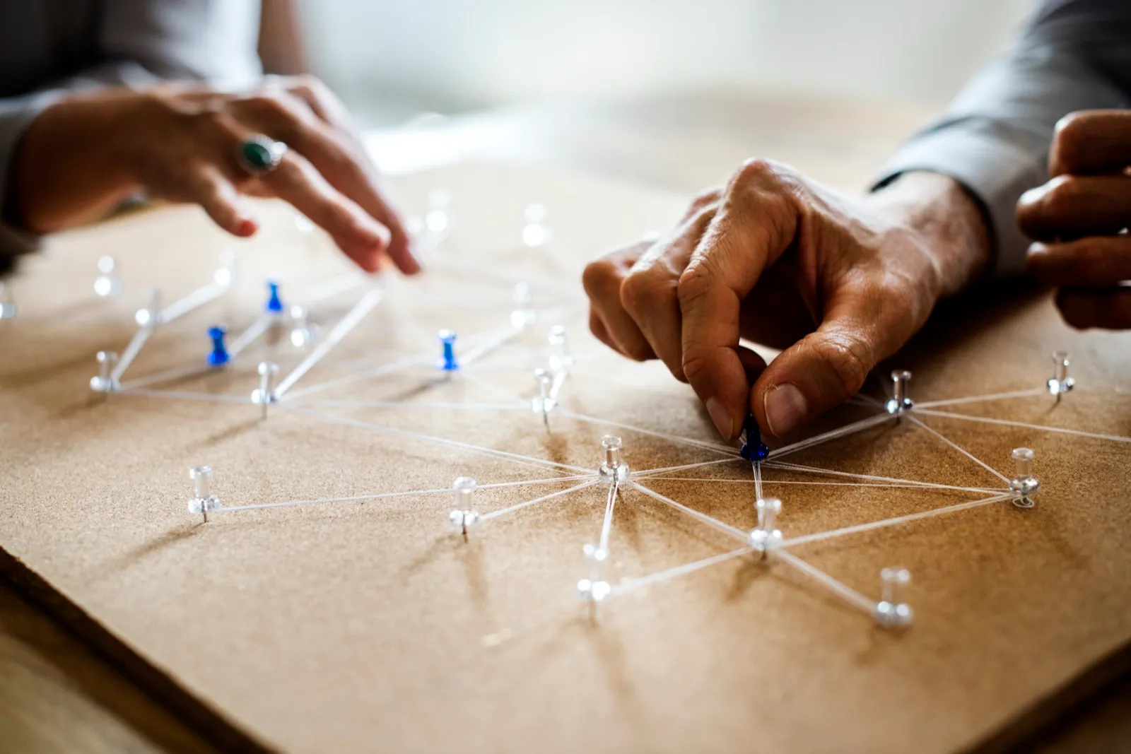People collaborating on a connected network of devices