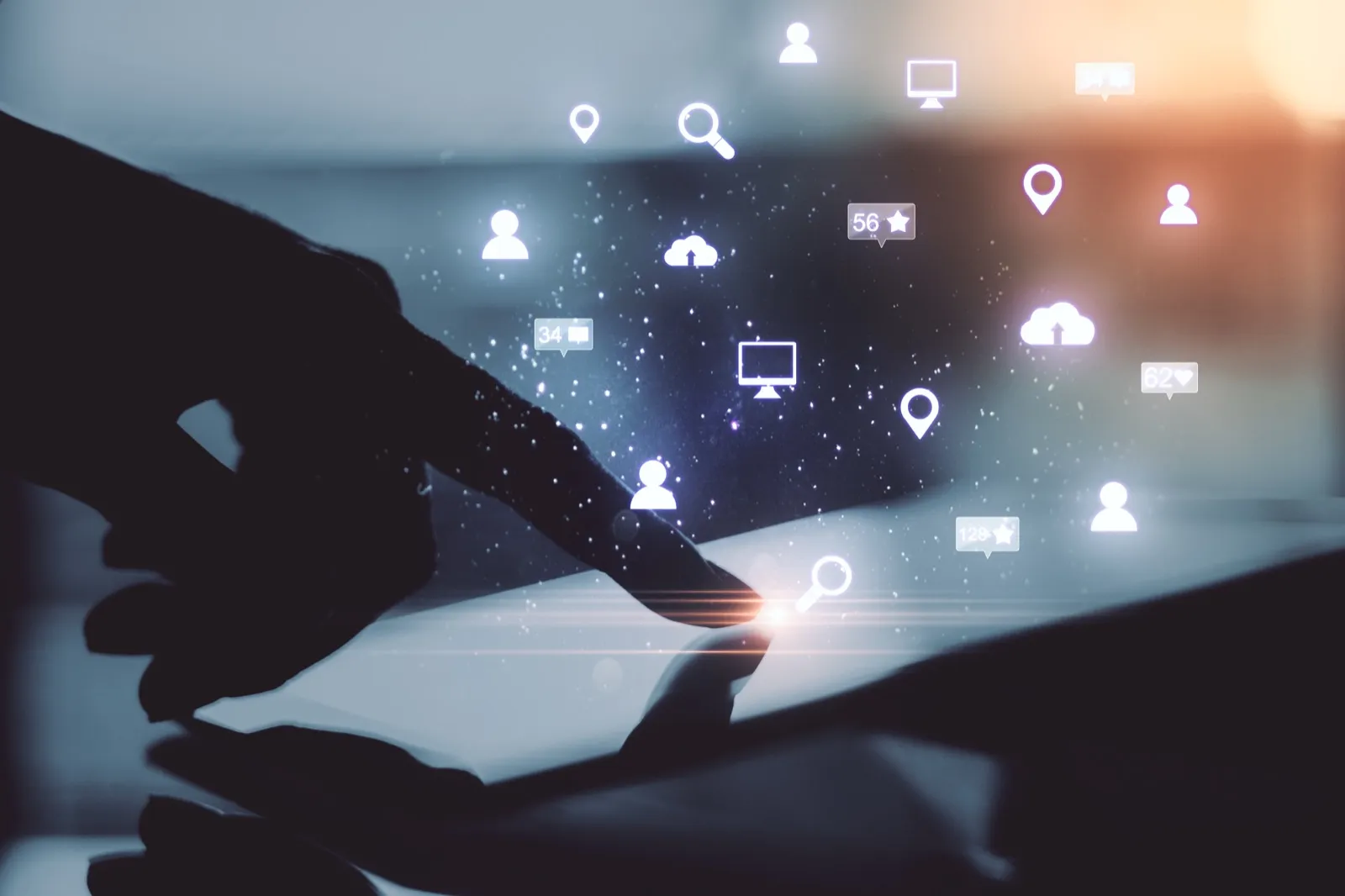 Hand interacting with social media engagement icons